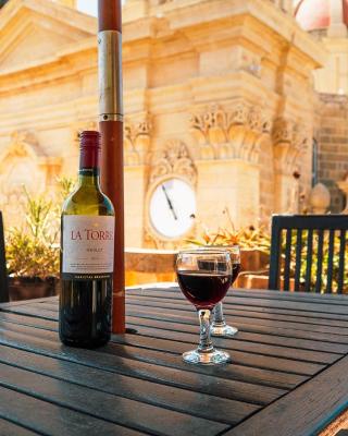 A Holiday Home Duplex in a Gozo Village Square