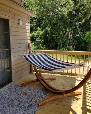 Tiny home with hammock loft BBQ and yard