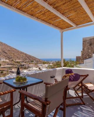 Cycladic traditional house with view