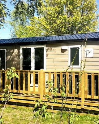 Modern holiday Chalet on lake side holiday park