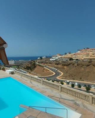 Apartment with view, wifi and pool in Arguineguin