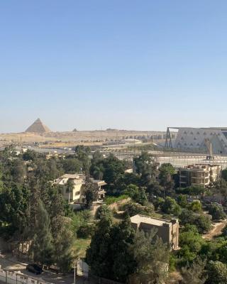 pyramids grand museum inn