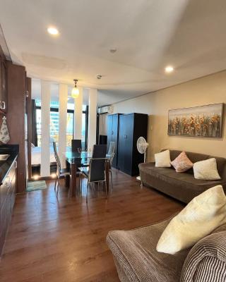 Appleone Ayala Condo with Balcony