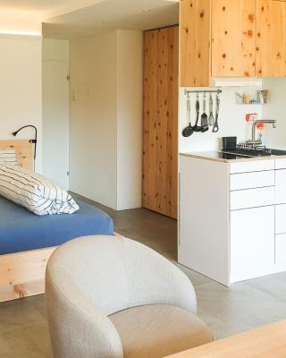 Modernes Alpenstudio mit Bergblick, Pool und Sauna
