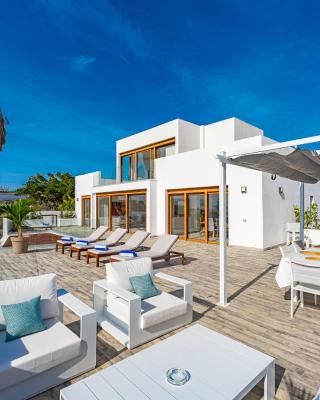 Fabulous contemporary 5 bedroom villa with private heated pool, sleeps max 13