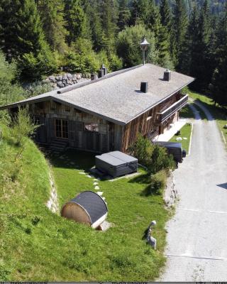 Luxury old wood mountain chalet in a sunny secluded location with gym, sauna & whirlpool