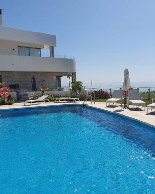Luxury beachfront apartment with pool, sauna, fitness and gym in province Malaga, Andalusia