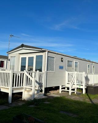 Beachcomber, A Modern caravan with CH and DG, Smart tv in every room and private broadband