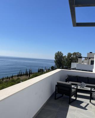 Sunny penthouse beach apartment with panoramic views