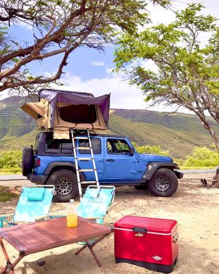 Embark on a journey through Maui with Aloha Glamp's jeep and rooftop tent allows you to discover diverse campgrounds, unveiling the island's beauty from unique perspectives each day