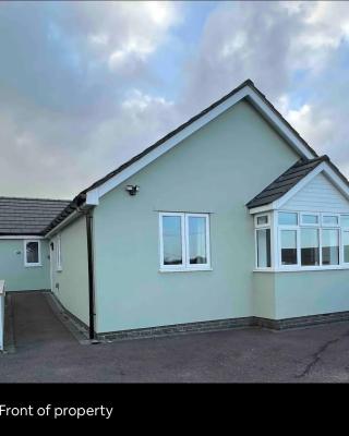 Green 3 bed bungalow with en-suite and parking