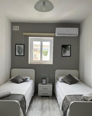 F3-3 Room 2 single beds shared bathroom