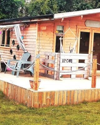 Luxury log cabin with wood fired hot tub