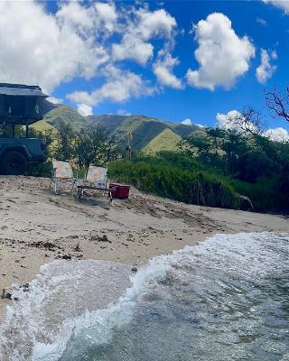 Embark on a journey through Maui with Aloha Glamp's jeep and rooftop tent allows you to discover diverse campgrounds, unveiling the island's beauty from unique perspectives each day