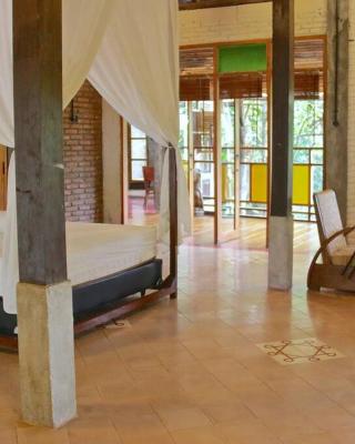 Riverside villa in tropical setting