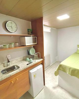 STUDIO aconchego, com Ar, Wifi, Smartv e Cozinha