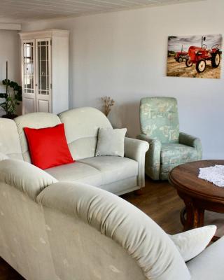 Ferienhaus zum roten Traktor