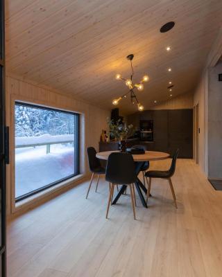High standard cabin in a quiet area in the bossom of nature near Flå