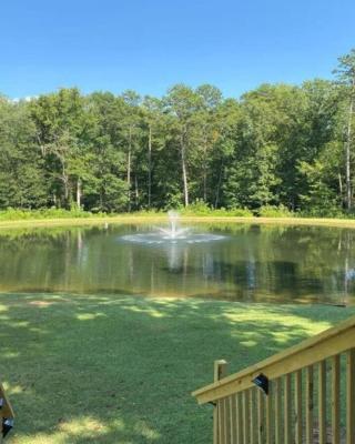 Serene 1BR Cabin near NC Z00 with Loft & Waterview