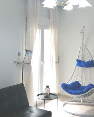 Blue swing chair apartment