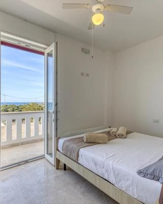 Camere arcobaleno vicino al mare a Torre san Giovanni