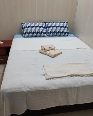 Quarto confortável em Est Velha