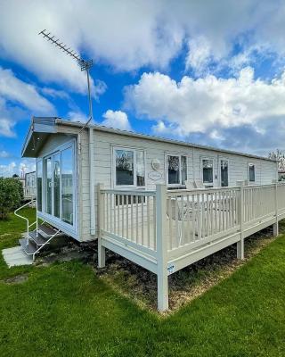 Beautiful Caravan With Decking At California Cliffs In Scratby Ref 50052l