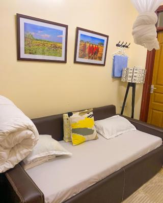 JKIA SGR Transit Pod - Small Room With Shower & Sofa Bed