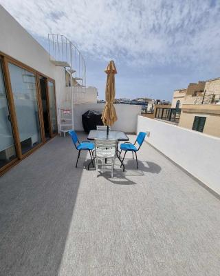 Spacious Townhouse with a Terrace overlooking Valletta's Grand Harbor