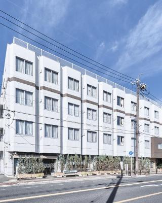 Okasan Hotel