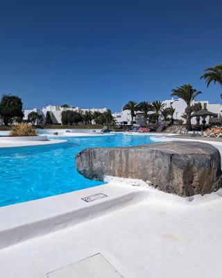 Charming Flat in Los Molinos with Terrace & Pools, Near Playa Bastian