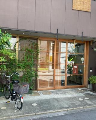 Guesthouse Hyakumanben Cross