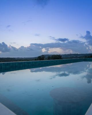 ELIVAAS 1 BHK with Jacuzzi & Lift - Kamerios Brisa