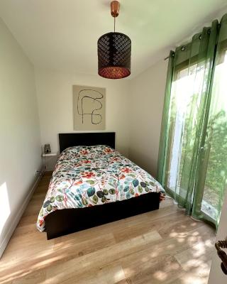 Appartement dans un ecrin de verdure terrasse privee