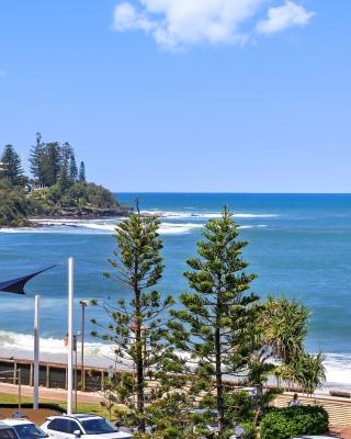 Absolute Beachfront Rolling Surf Resort
