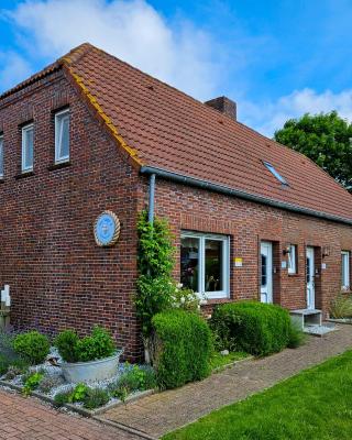 Ferienhaus Oll Smee 9 Huus EEN mit Terrasse, Grill und kleinem Garten