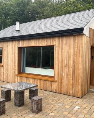Cosy Studio Cabin set in nature with stove