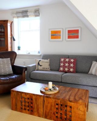 Neuerbautes Haus im Friesenstil. Moderne 2-Zimmer-Appartements mit Balkon für bis zu 4 Personen