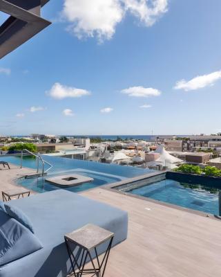 Vista al mar, 5th avenida caminando a la playa