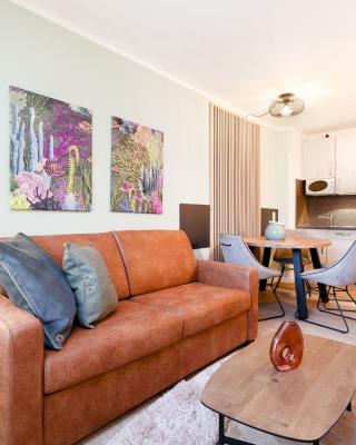 Das Solaris 3 Beach Apartment mit Balkon, Gemeinschaftssauna und Grillplatz
