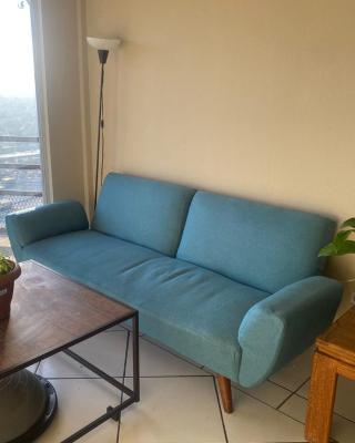 Habitación en departamento con vista a la ciudad