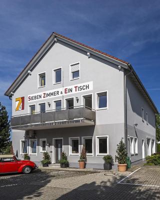 Sieben Zimmer & Ein Tisch