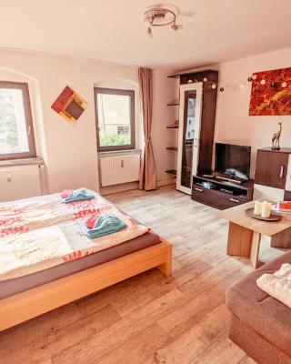Famzi - Urlaubsmagie - Familienwohnung mit Gemeinschaftsgarten, -sauna & -pool
