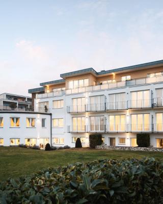 Hotel Vier Jahreszeiten an der Therme & Kliniken Bad Krozingen Nähe Freiburg & Schwarzwald Ideal für Wellness Kur & Business Ausflüge 24h Check In- WLAN & Parken gratis