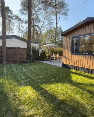 VELUWE HOLIDAY HOMES - With Community Swimming Pool, Bar, Restaurant, Bowling and Supermarket Facilities in the Veluwe National Park