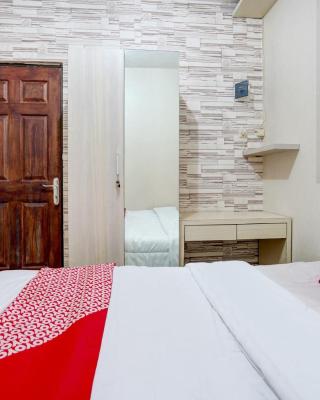 OYO Life 90606 Glass House Citraland Syariah