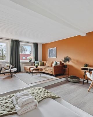 MAISUITES Sperling - Zentrale Ferienwohnung mit Boxspringbett, Kaffeevollautomat, WLAN & seitlichem Seeblick