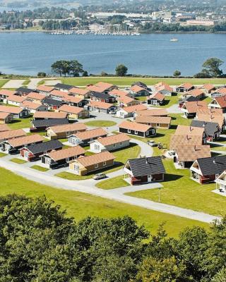 6 person holiday home on a holiday park in Gråsten