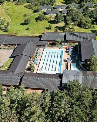 6 person holiday home on a holiday park in Gilleleje