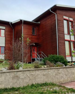 Apartmán v dřevěném domě